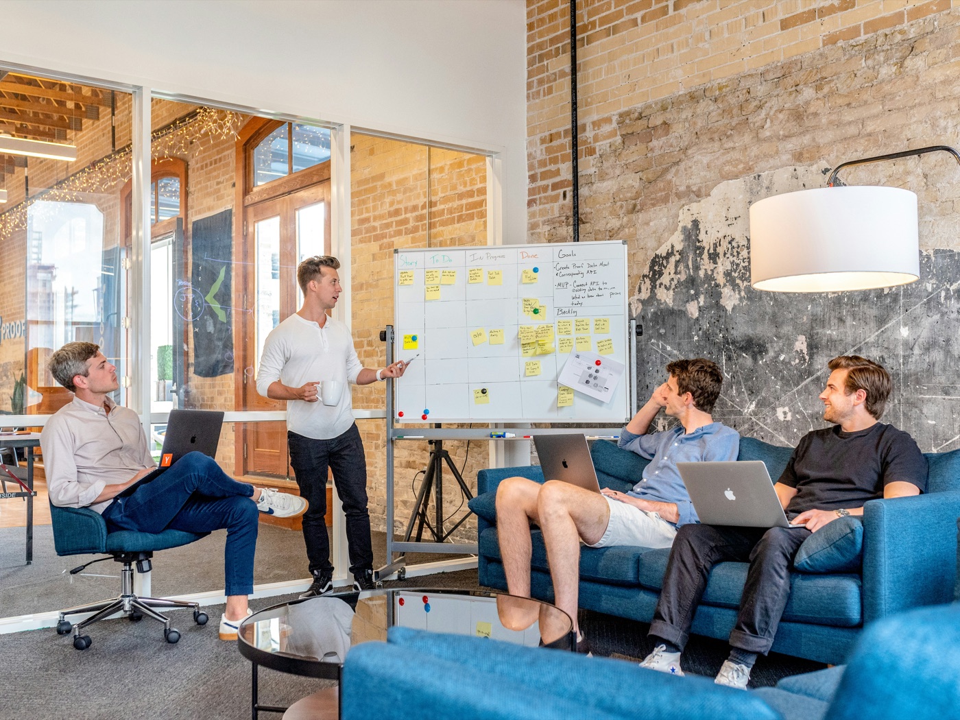 The TrustyRecruit team reviewing a hiring plan together